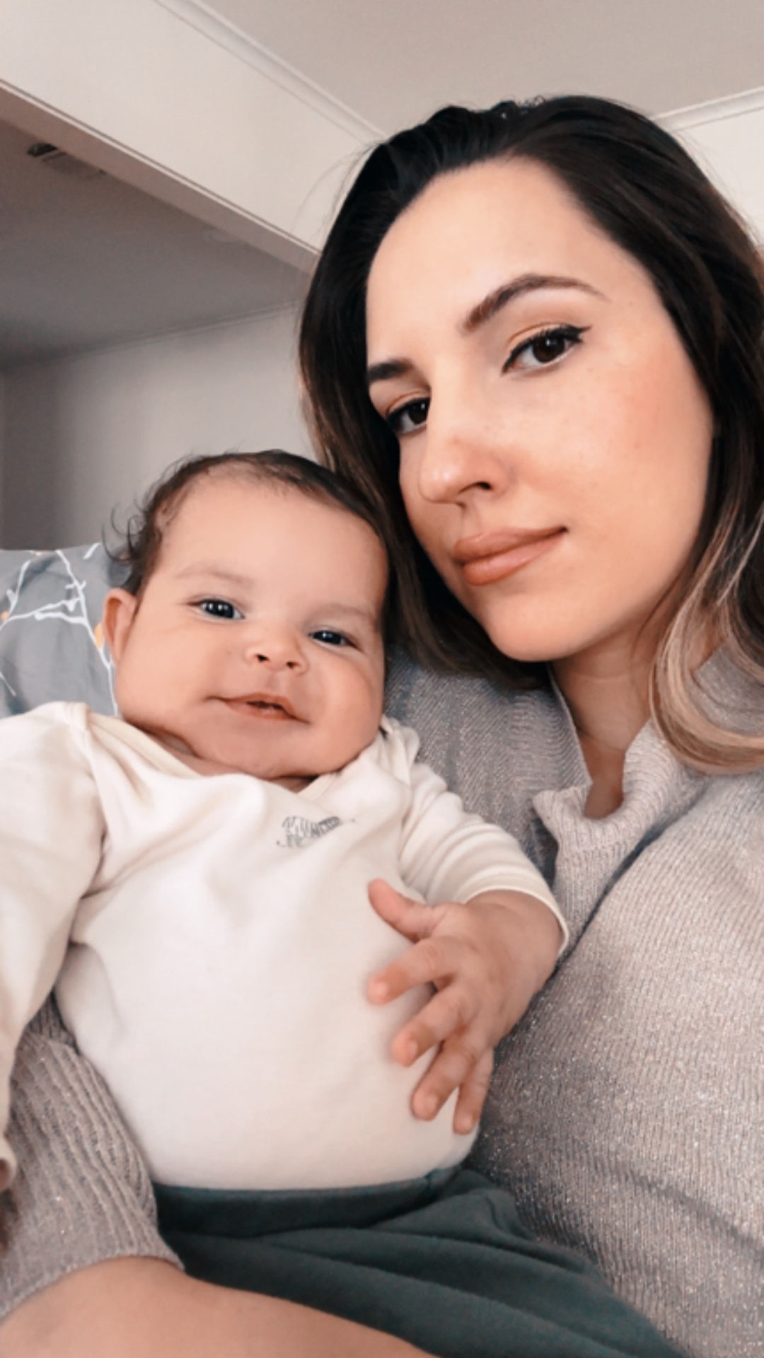 Emilia Williams holding her baby